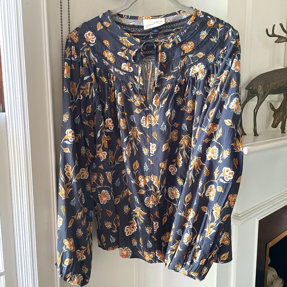 Brown floral peasant blouse.